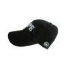 A black hat with the word " yolo ".