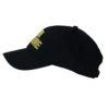A black hat with a yellow logo on it