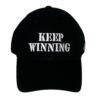 A black hat with the words " keep winning ".