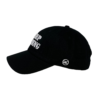 A black baseball cap with the words keep moving on it.