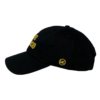 A black hat with yellow lettering and a smiley face.
