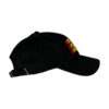 A black hat with a yellow and red stripe on it.