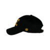 A black hat with yellow lettering on it.