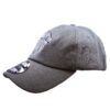 A gray hat with a black and white logo.