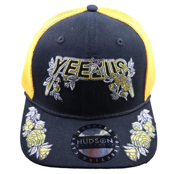 A black and yellow hat with the words yee-ha 1 1 5 on it.