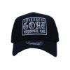 A black hat with a white patch on it