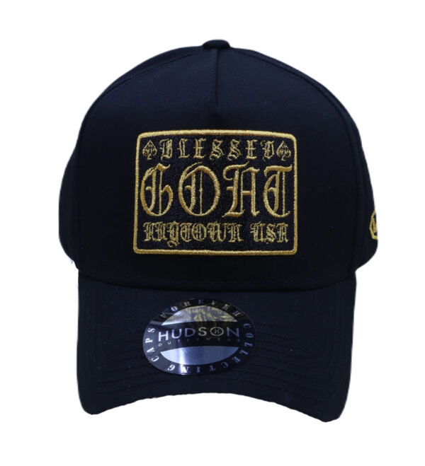 A black hat with gold lettering on it.