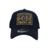 A black hat with gold lettering on it.