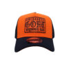 A orange and black hat with the words " unleash god ".