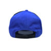 A blue and black hat with a white logo on it.