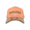 A hat that says blessed on it.