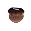 A brown hat with a black and white logo on it