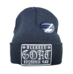 A black beanie with a goat patch on it.