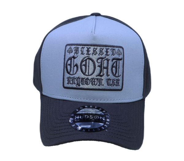 A goat hat with the word " goat " on it.