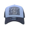 A light blue and black hat with a goat logo.
