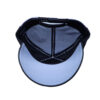 A cap that is sitting on top of a table.