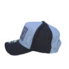 A black and white hat with a patch on the side.
