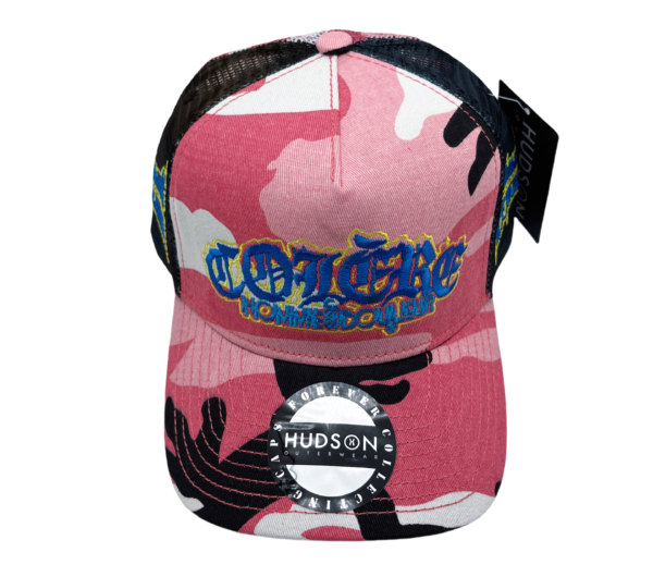 A pink camo hat with the word " cocaine ".