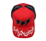 A red hat with black and white writing on it.