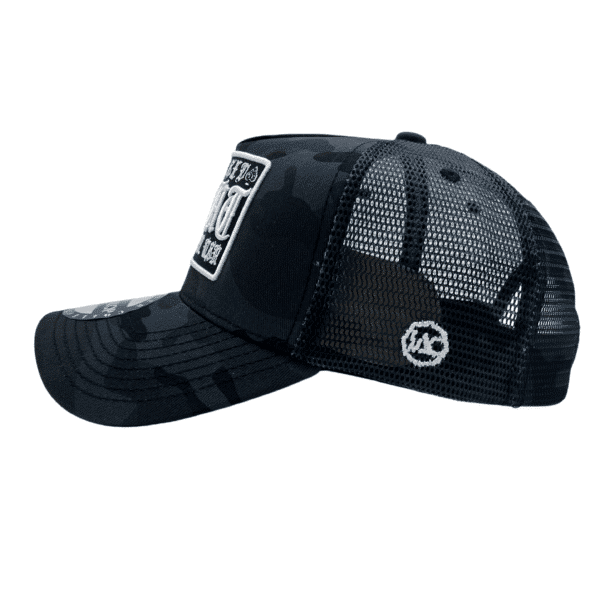 A black hat with a patch on the side of it.