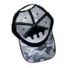 A white and black hat with a face on it