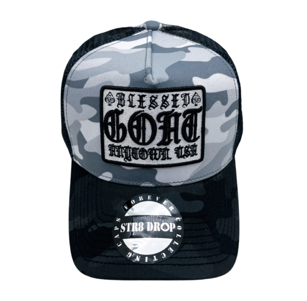 A black and white camo hat with a patch on it.