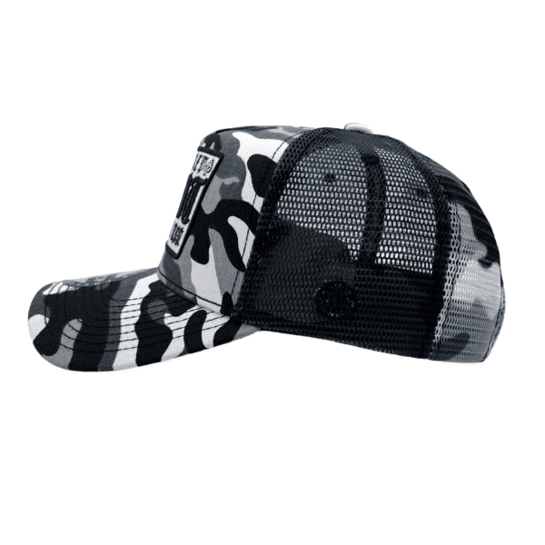 A black and white camouflage hat with a patch on the side.