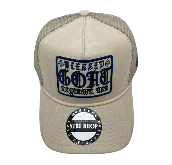 A tan hat with a patch on the front of it.