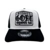 A black and white hat with the words " blessed goat ", around it.