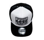 A black and white hat with the words " reckless bold " on it.