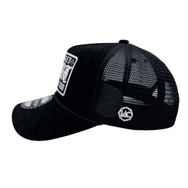 A black hat with a patch on the side of it.