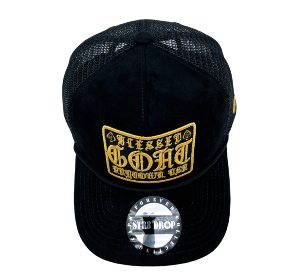 A black and yellow hat with the words " blessed to kill " on it.