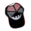 A black and red hat with an open mouth.