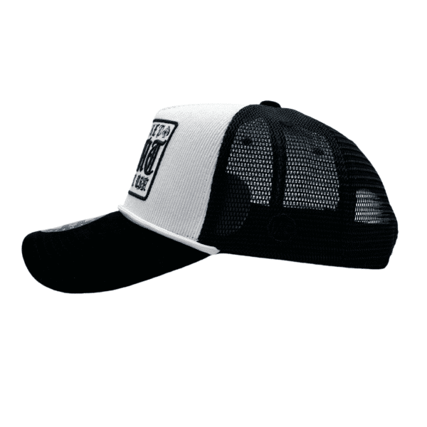 A black and white hat with the words " detroit " on it.