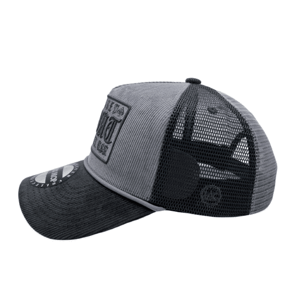 A gray and black hat with a patch on the side.