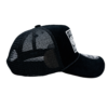A black hat with a patch on the side of it.