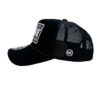 A black and white hat with a patch on it