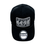 A black hat with a patch on it