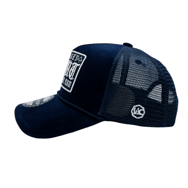 A black hat with a white patch on the side.