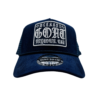 A blue hat with a white patch on the front.