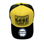 A black and yellow hat with the words " bleeker ford garage " on it.
