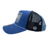 A blue and black hat with a patch on it