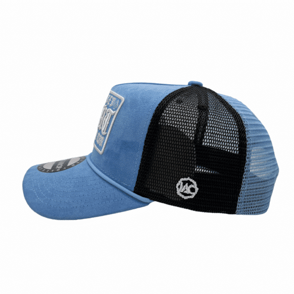 A blue and black hat with a patch on it