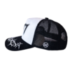 A black and white hat with a logo on it.