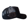 A black hat with a logo on it