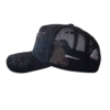 A black hat with a picture of a bear on it.