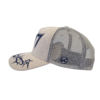 A white hat with blue writing on it.